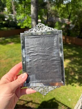 Vintage silver frame with bow details